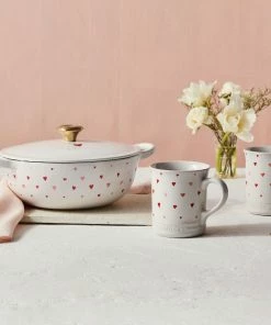 Le Creuset L'Amour 2.75 Qt. Enameled Cast Iron Soup Pot With Gold Knob & Heart Applique | White 16 Le Creuset L'Amour 2.75 Qt. Enameled Cast Iron Soup Pot With Gold Knob & Heart Applique | White -Cookware Sets Shop rs13357 201020 lecreuset lamourcollection 0474 ret
