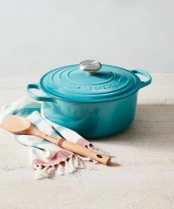 Le Creuset 5.5 Qt. Round Signature Cast Iron Dutch Oven With Stainless Steel Knob | Caribbean Blue 13 Le Creuset 5.5 Qt. Round Signature Cast Iron Dutch Oven With Stainless Steel Knob | Caribbean Blue -Cookware Sets Shop rs14418 rs8350 180319 lca caribbean rdo 016 soft sunlight ss