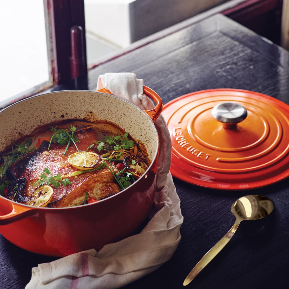 Le Creuset 5.5 Qt. Round Signature Cast Iron Dutch Oven With Stainless Steel Knob | Flame Orange 6 Le Creuset 5.5 Qt. Round Signature Cast Iron Dutch Oven With Stainless Steel Knob | Flame Orange - Image 4